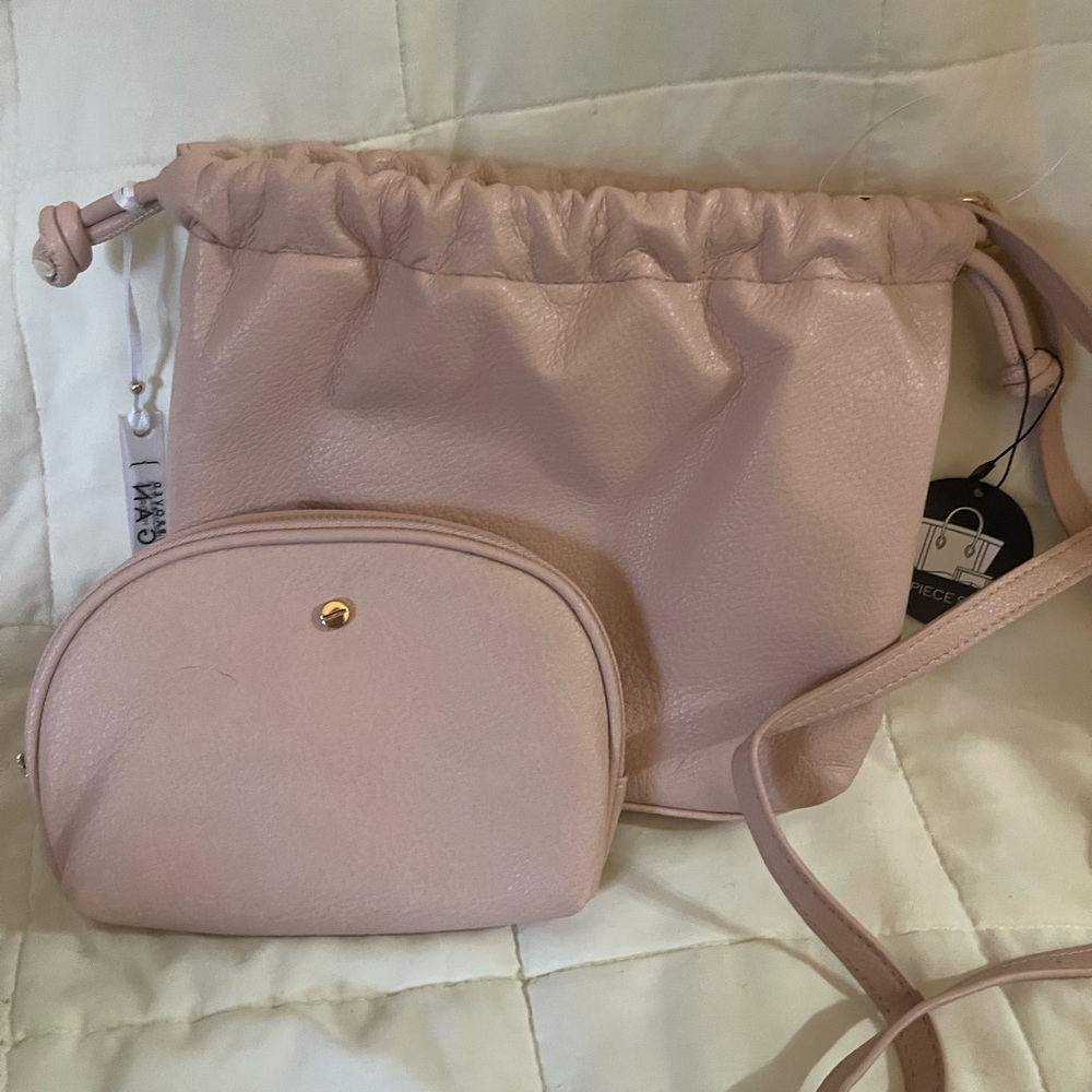 Crossbody and cosmetic set 
Pink and nwt